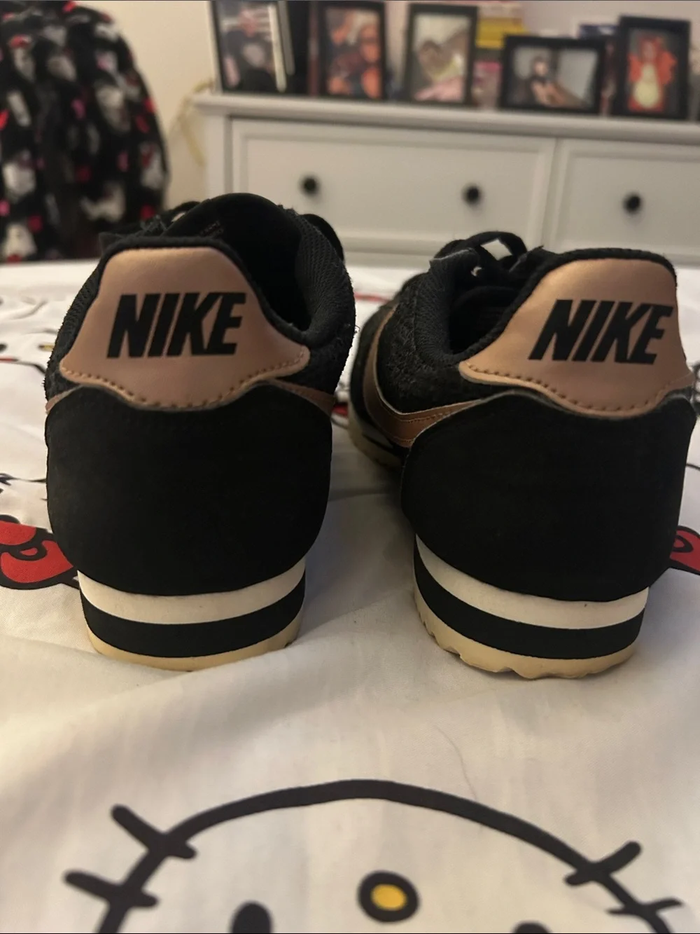 Nike Black Low-Top Sneakers with Bronze Swoosh